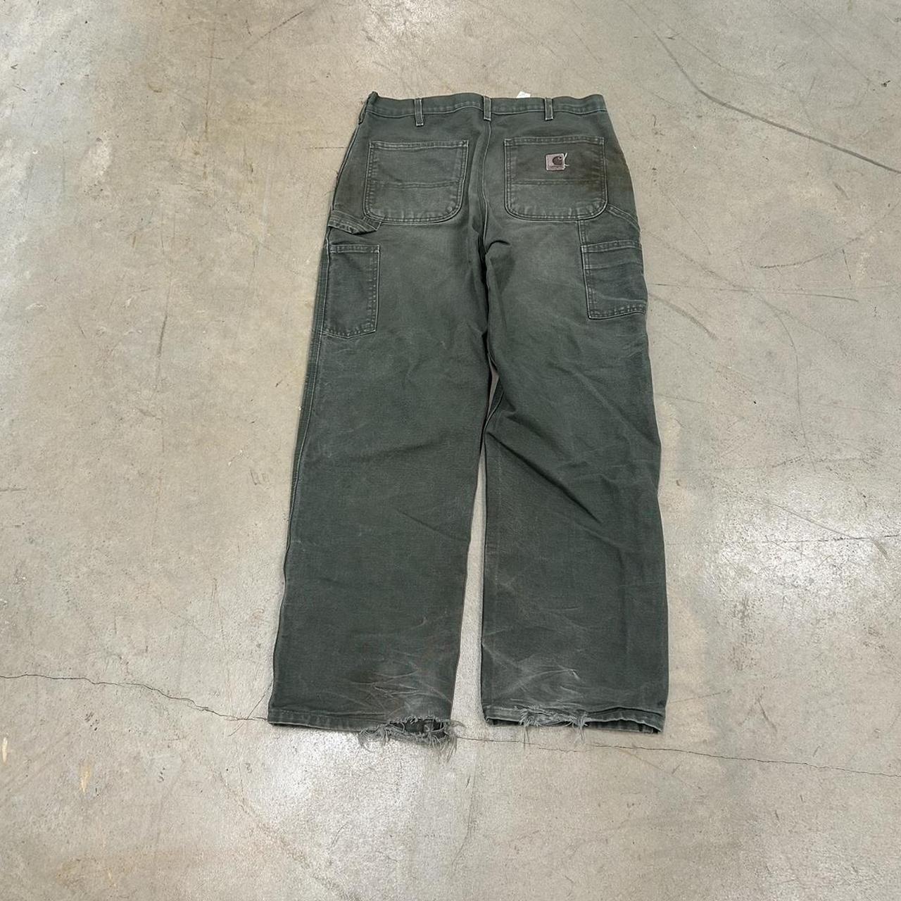 Vintage Carhartt Army Green Canvas Pants – Size 33x32 – Heel Drag, Paint Stain, Faded Patch – Okay Condition