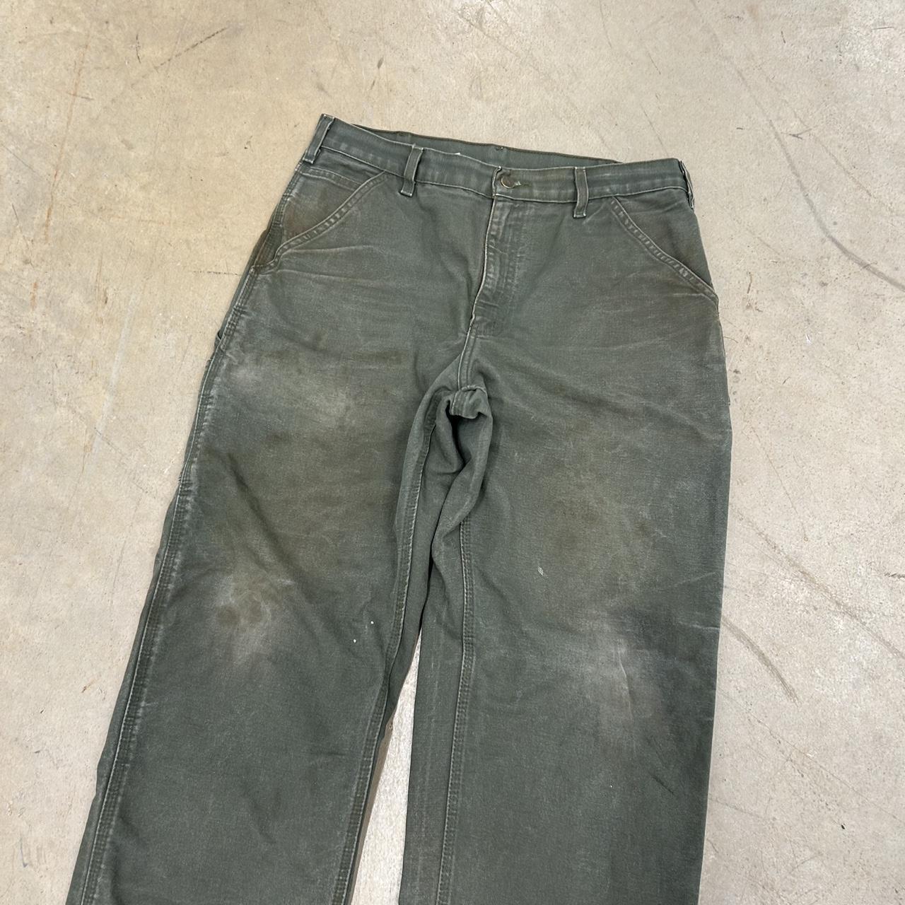 Vintage Carhartt Army Green Canvas Pants – Size 33x32 – Heel Drag, Paint Stain, Faded Patch – Okay Condition