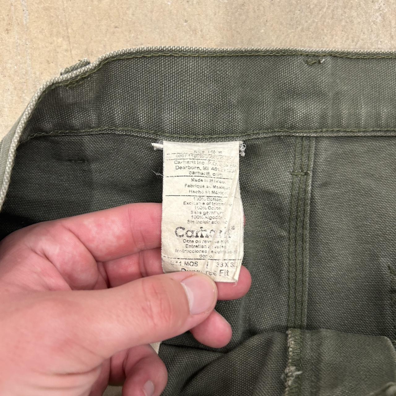 Vintage Carhartt Army Green Canvas Pants – Size 33x32 – Heel Drag, Paint Stain, Faded Patch – Okay Condition